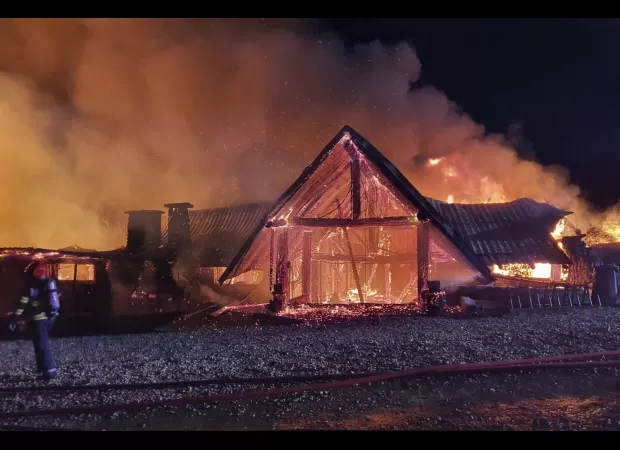 Five people, including a child, died in a fire at a guesthouse on Boxing Day.