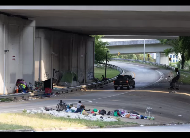 Atlanta clears homeless encampments due to bridge fires.