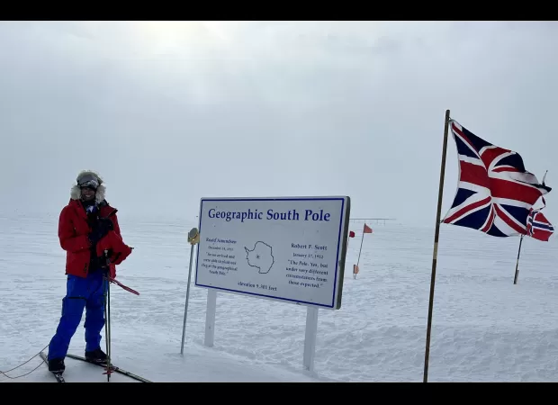 A British Army officer became the fastest woman to ski around Antarctica.