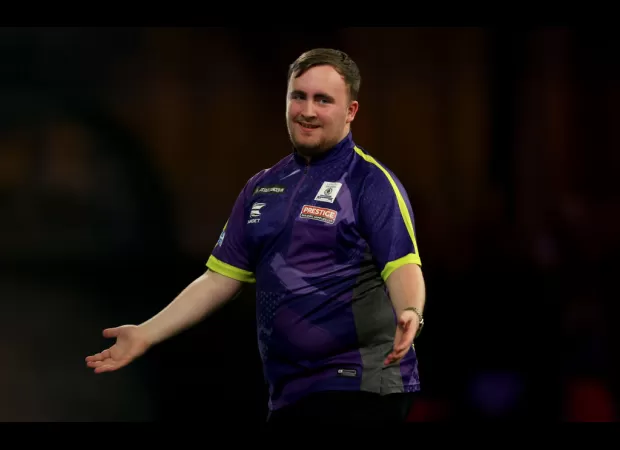 Luke Littler triumphs over Rob Cross, earning a spot in the World Darts Championship final.