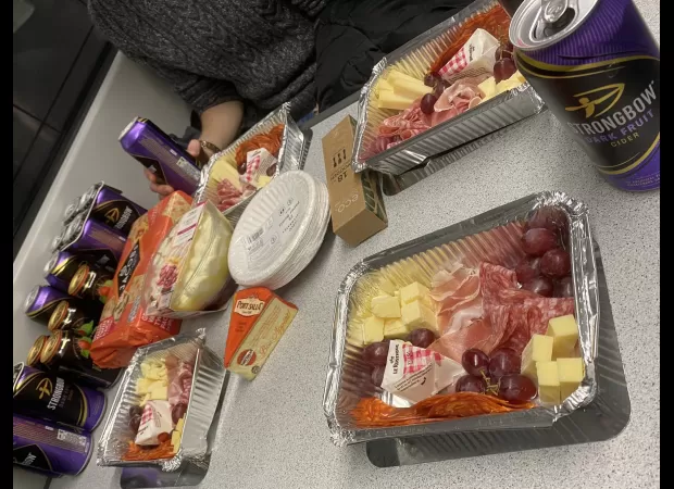 Football fans now enjoying charcuterie boards instead of pies on away days.