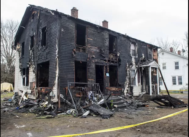 Four children tragically died in a house fire as helpless neighbors attempted to put it out with extinguishers.