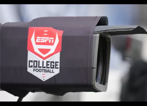 ESPN apologizes after camera captures woman showing her breast during broadcast.