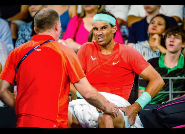 Rafael Nadal suffers injury scare ahead of Australian Open, causing concern in Brisbane.