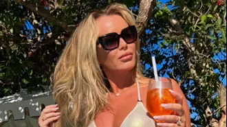 Amanda Holden stuns in her latest beachwear snaps, looking effortlessly stylish.