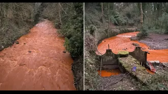 River in Wales changes color from dull grey to vibrant orange.