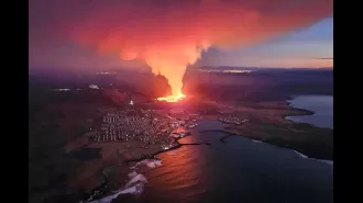 An Icelandic volcano erupts, causing lava to spew into the evacuated town of Grindavik.