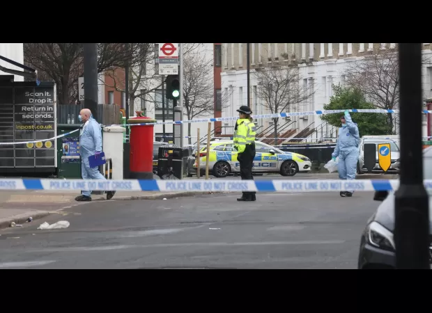 A woman was shot and three others were injured during a fight at a church birthday party.