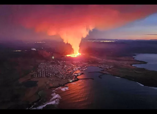 An Icelandic volcano erupts, causing lava to spew into the evacuated town of Grindavik.