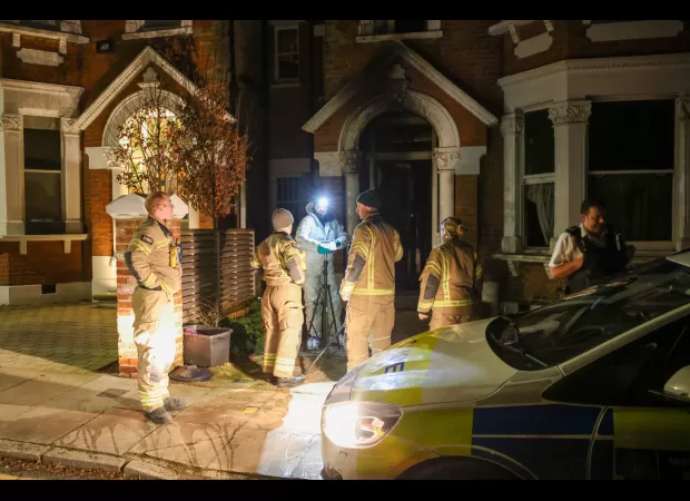 A man has passed away following a fire that engulfed a three-story house in south-west London.