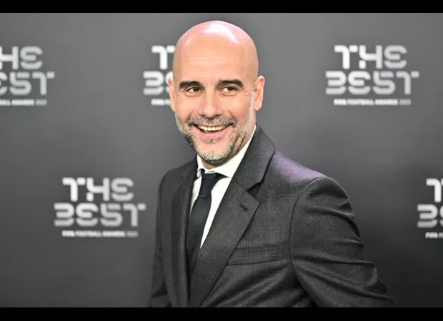 Soccer coach Pep Guardiola swears during live event with Thierry Henry at FIFA Best Awards.