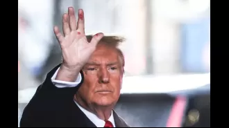 Trump explains reason for odd red marks on his hand.