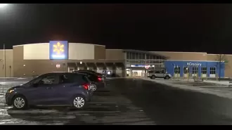 Parents run from police at Walmart and leave their baby behind.