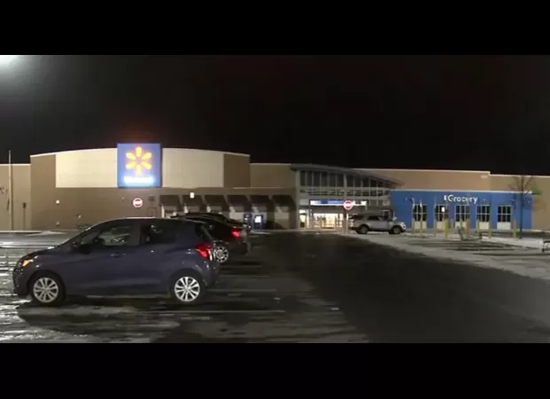 Parents run from police at Walmart and leave their baby behind.