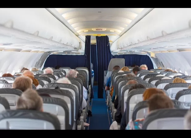 Flight attendants dislike clapping and other behaviors you should avoid when flying.