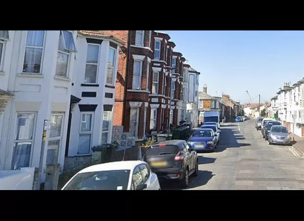 Man detained for murder after female corpse found in coastal town of Norfolk.