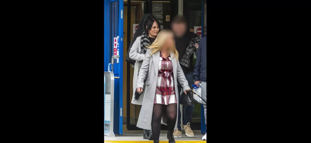 Two women fight in road rage incident, causing traffic to stop.