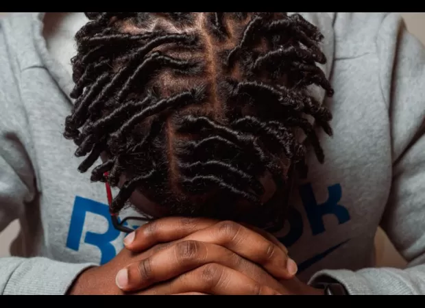 Houston school leader defends decision to suspend student with locs in newspaper ad.