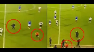 Angry Port Vale supporter chases referee off field for awarding penalty against team in game against Portsmouth.