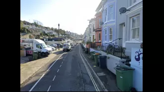 A 9-year-old boy dies after being spotted walking around the street and a man has been arrested.