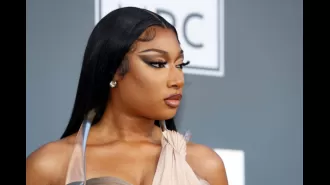 Security is increased at Megan Thee Stallion's mother's grave due to threats from Nicki Minaj's fans.