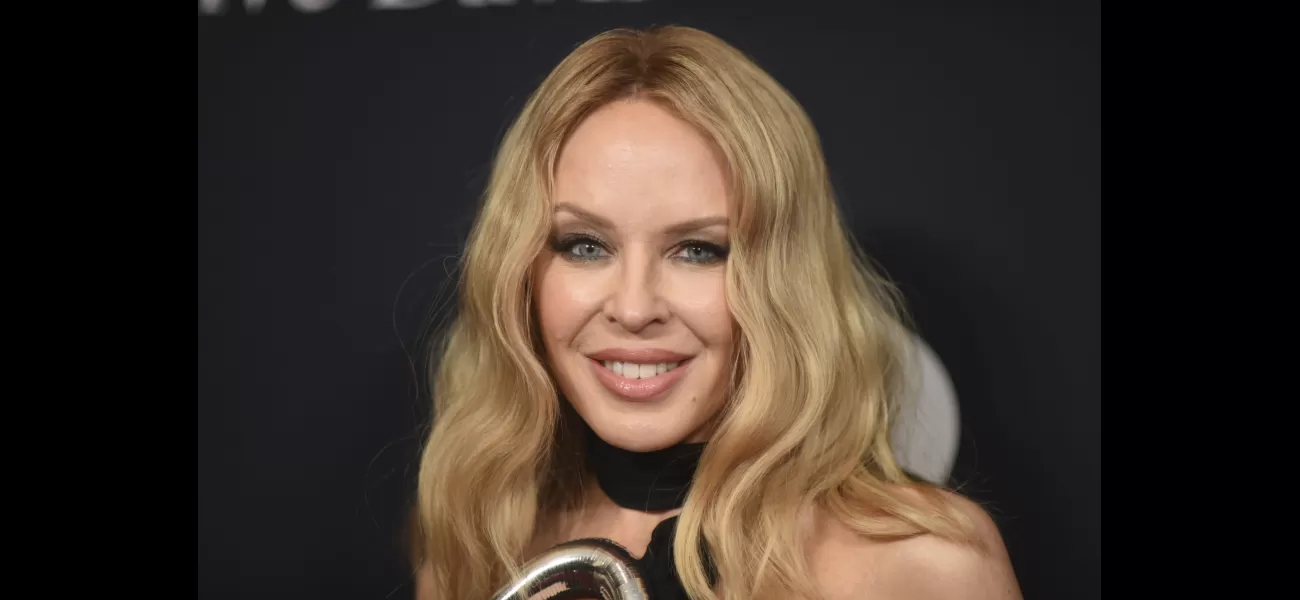 Kylie Minogue overjoyed to win second Grammy two decades after first.