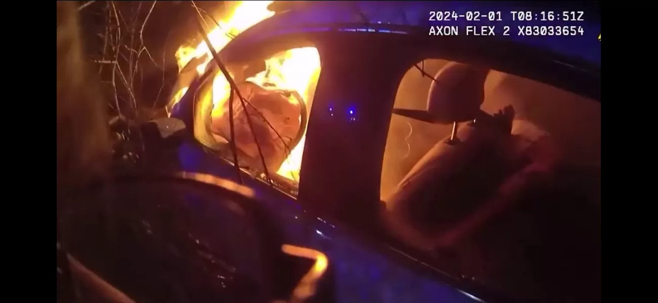 Police heroically save man from burning car in dramatic rescue.