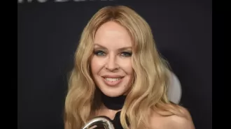 Kylie Minogue overjoyed to win second Grammy two decades after first.