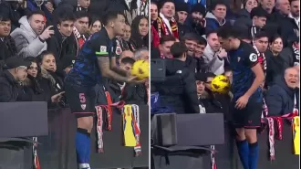 Sevilla player calls for action after fan pokes him during match.