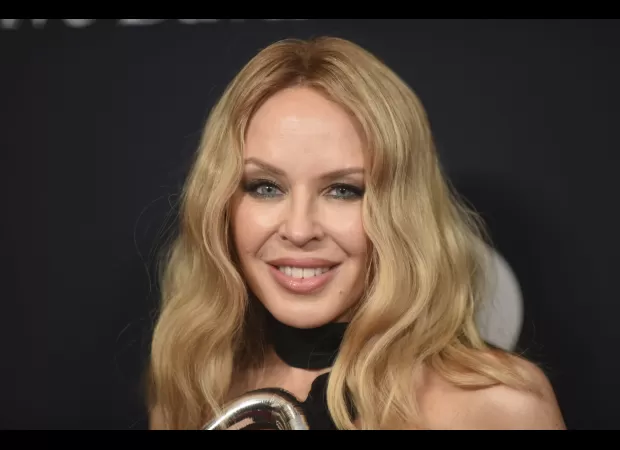 Kylie Minogue overjoyed to win second Grammy two decades after first.