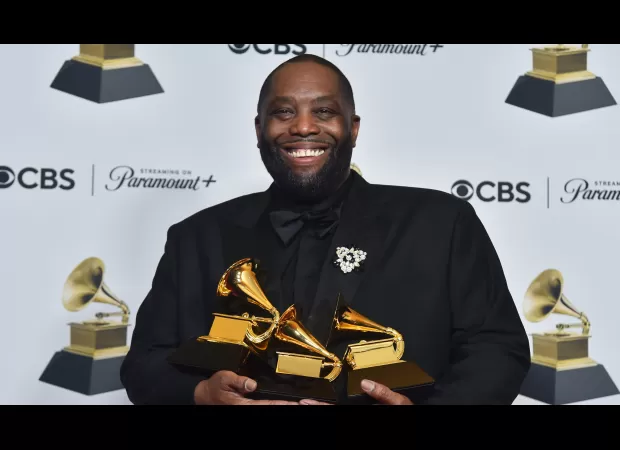 Rapper arrested after Grammys win, taken away in handcuffs.