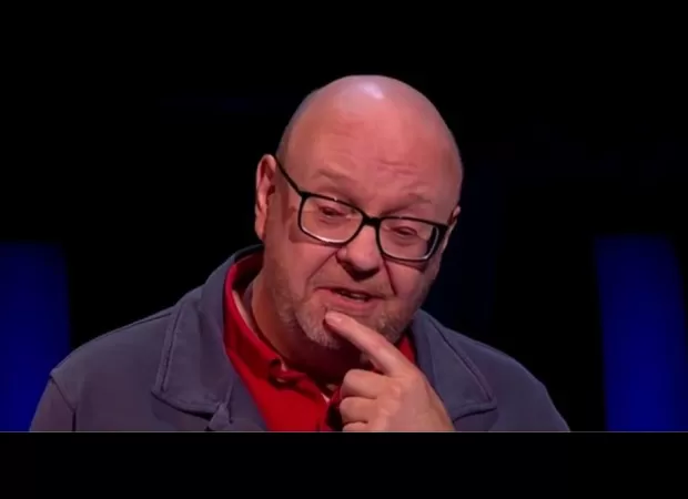 Contestant stuns audience on game show with celebrity phone-a-friend.