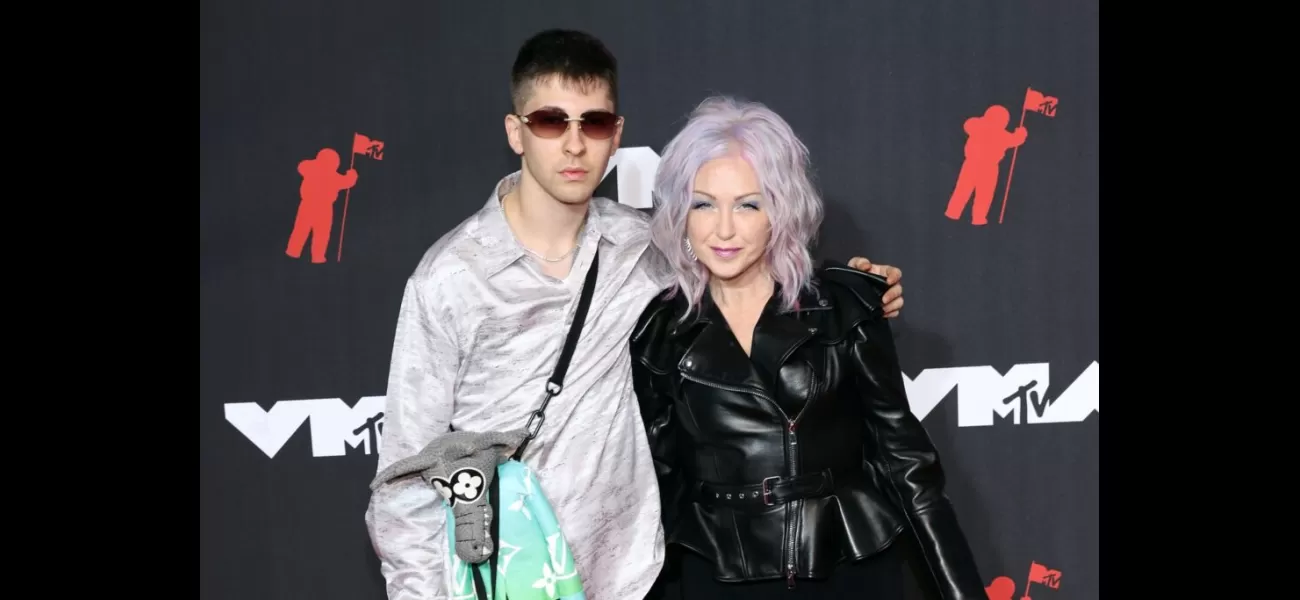 Singer Cyndi Lauper's son arrested for having gun after Harlem shooting.