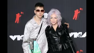 Singer Cyndi Lauper's son arrested for having gun after Harlem shooting.