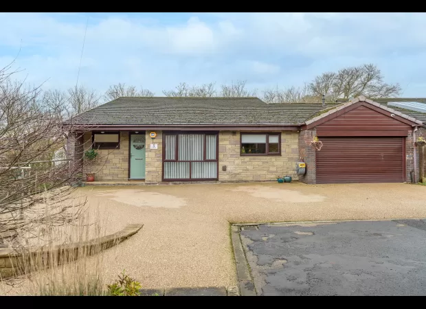 A seemingly dull bungalow actually holds a hidden three-story house.