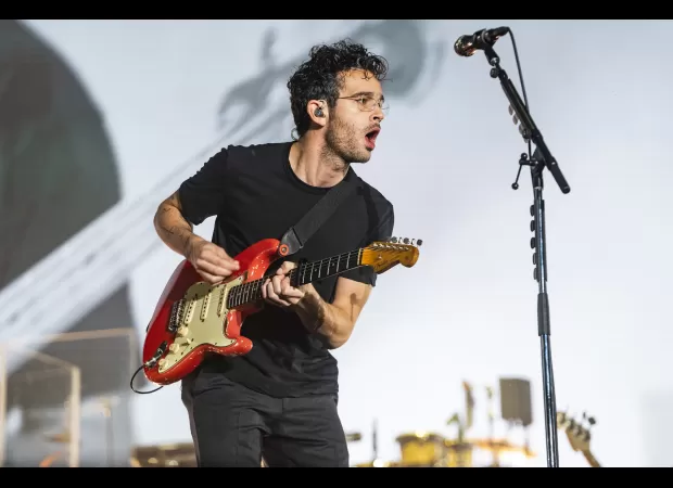 Fans of The 1975 criticized for camping out for three days before concert, deemed a safety risk.