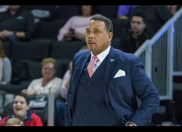 Georgetown's Coach Cooley responds to heckler after team's recent defeat.
