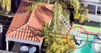 Burglar falls in pool while running from luxury home robbery.