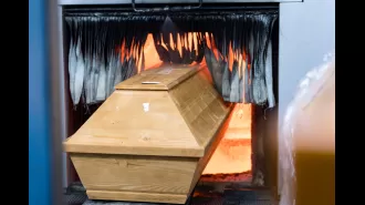 A woman unexpectedly revived while being transported in a hearse to her own cremation.