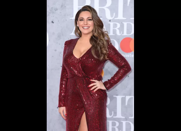 Kelly Brook prefers to be naked as a Heart Radio host.