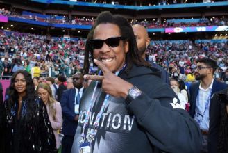 Roc Nation announces long-term collaboration with Versace during 2024 Super Bowl.