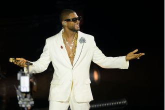 Usher recognized for promoting Atlanta and bringing the Super Bowl to the city in 2024.