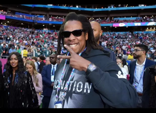 Roc Nation announces long-term collaboration with Versace during 2024 Super Bowl.