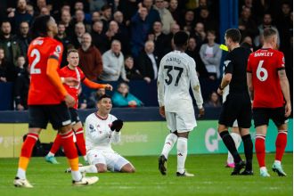 Jamie Redknapp criticizes a Manchester United player for repeatedly committing fouls during a match against Luton Town.