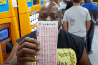 Powerball denies $350 million jackpot winner because of website error.