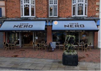 A young girl was airlifted to the hospital after falling from a window above Caffe Nero.