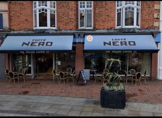 A young girl was airlifted to the hospital after falling from a window above Caffe Nero.