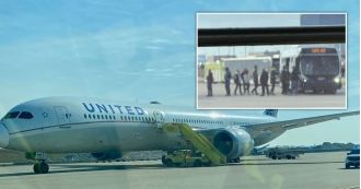 Bomb threat in airplane bathroom leads to emergency landing.