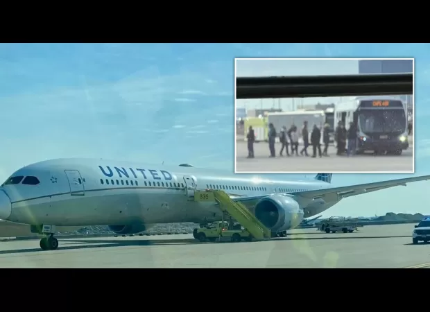 Bomb threat in airplane bathroom leads to emergency landing.