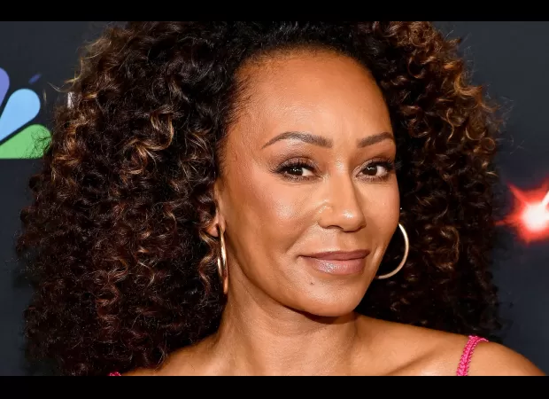 Former Spice Girl with only £700 in savings was spotted shopping at Lidl, trying to hide from her abusive ex-partner.